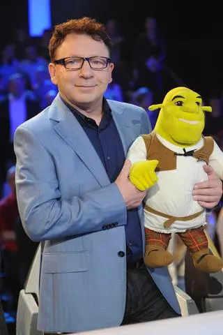 Zbigniew Zamachowski z maskotką Shreka