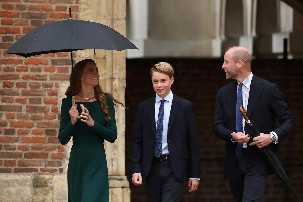 Książę George z księżną Kate i księciem William